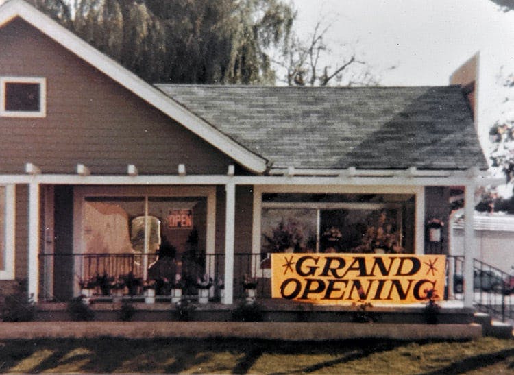 A large Grand Opening sign announces we're open for business, circa 1984 